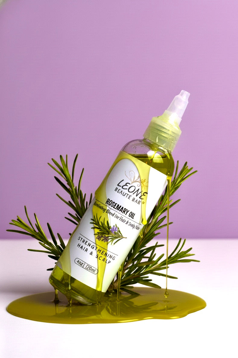 Bottle of Leone Rosemary Oil with rosemary leaves on a purple background