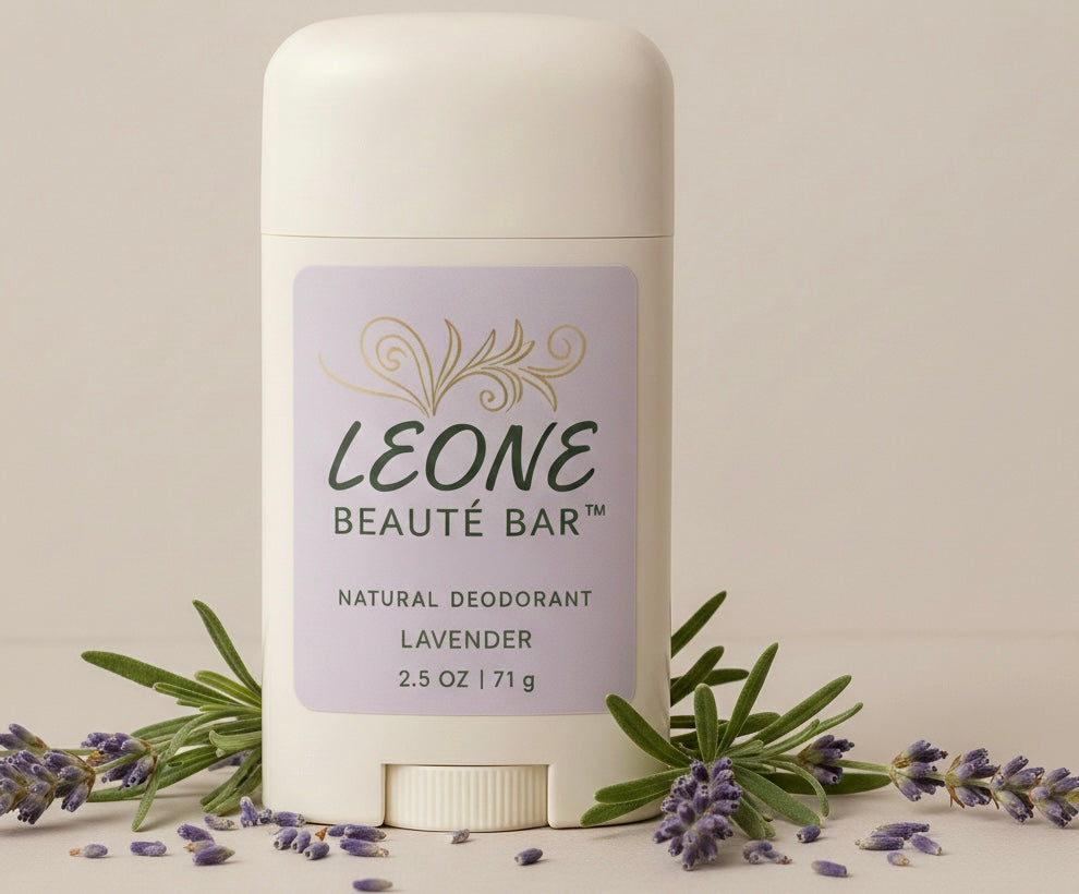 Natural deodorant stick with lavender flowers on a light background