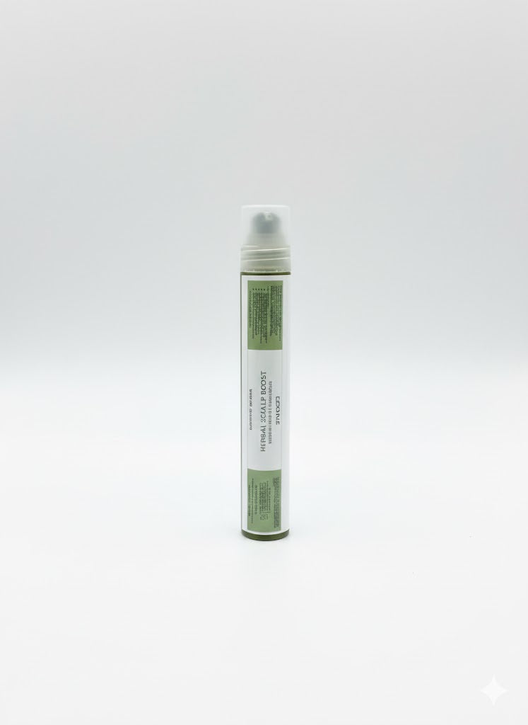 Herbal hair serum bottle with green label on a white background