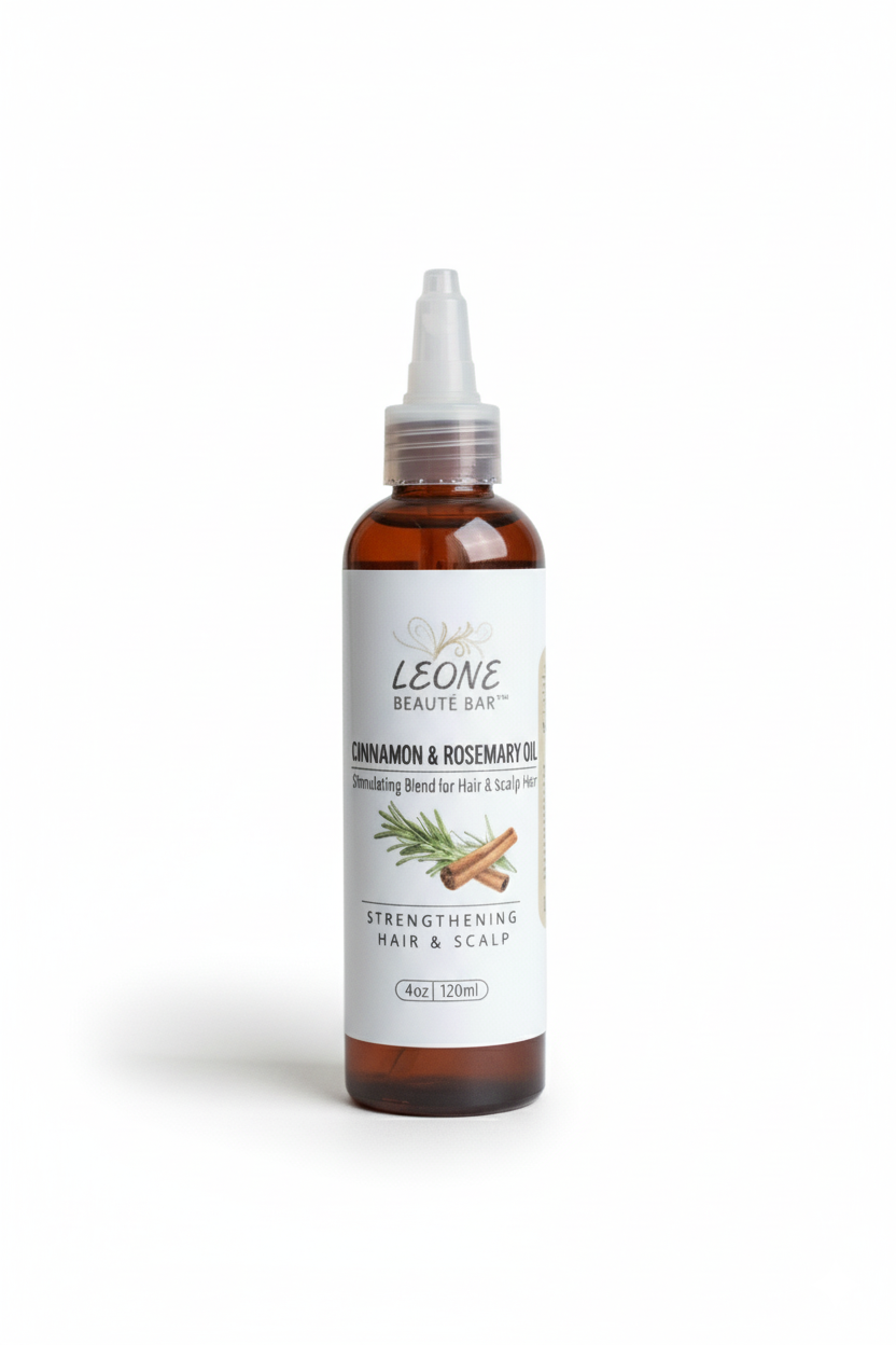 Bottle of Leone Beauté Bar Cinnamon & Rosemary Oil on a white background